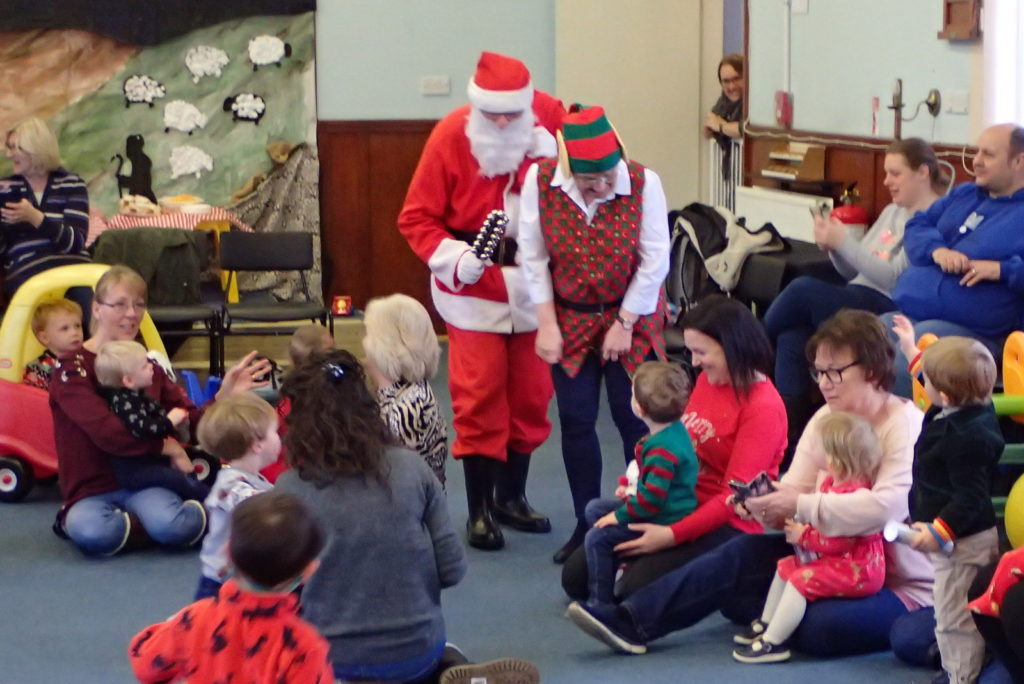 Santa and Elf at Tots Christmas Party