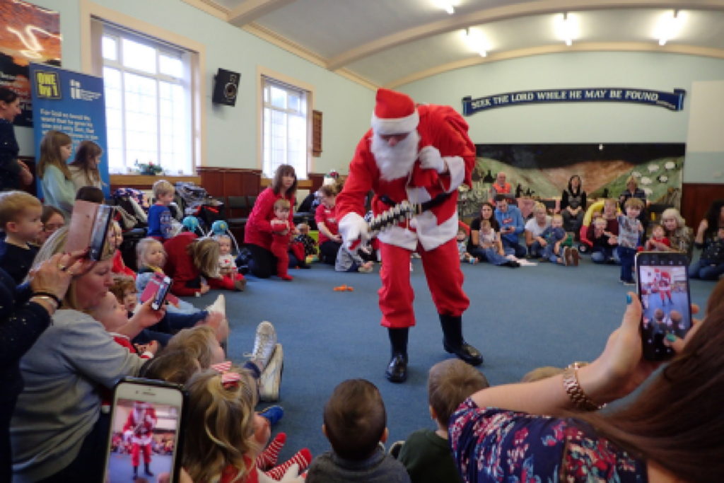 Santa at Tots Christmas Party
