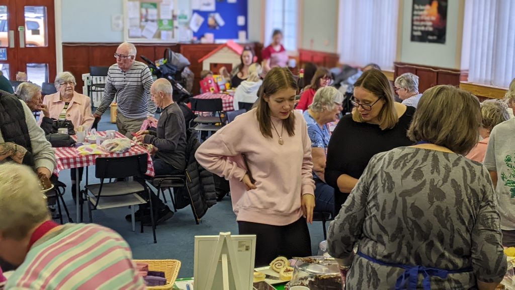 Room full of people for MacMillan coffee morning