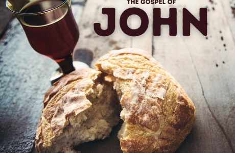 Cover image for the gospel of John, showing a glass of wine and a piece of bread